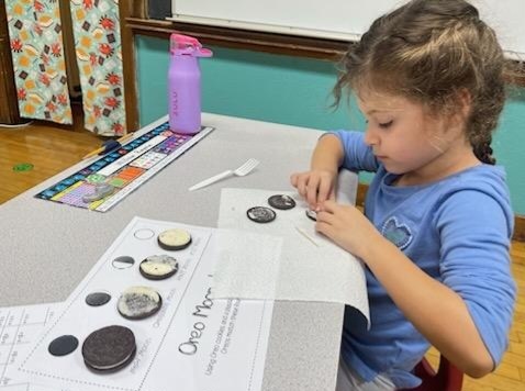 Mrs. Cogdill's 1st grade class is learning about astronomy! Today, we used Oreos to make and discuss the four stages of the moon. 